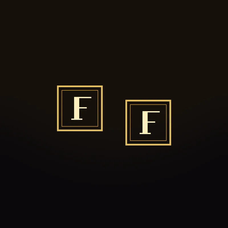 A pair of square gold cufflinks, each with an F